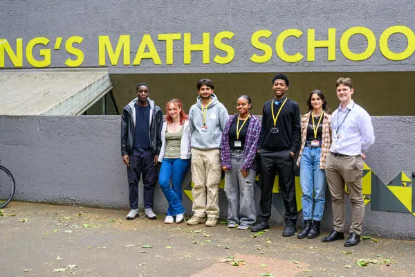 Tim and students in front of school Contensis 2024
