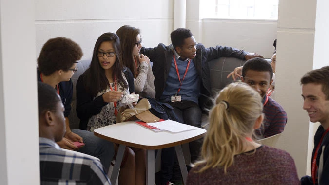 Students chatting together in the school